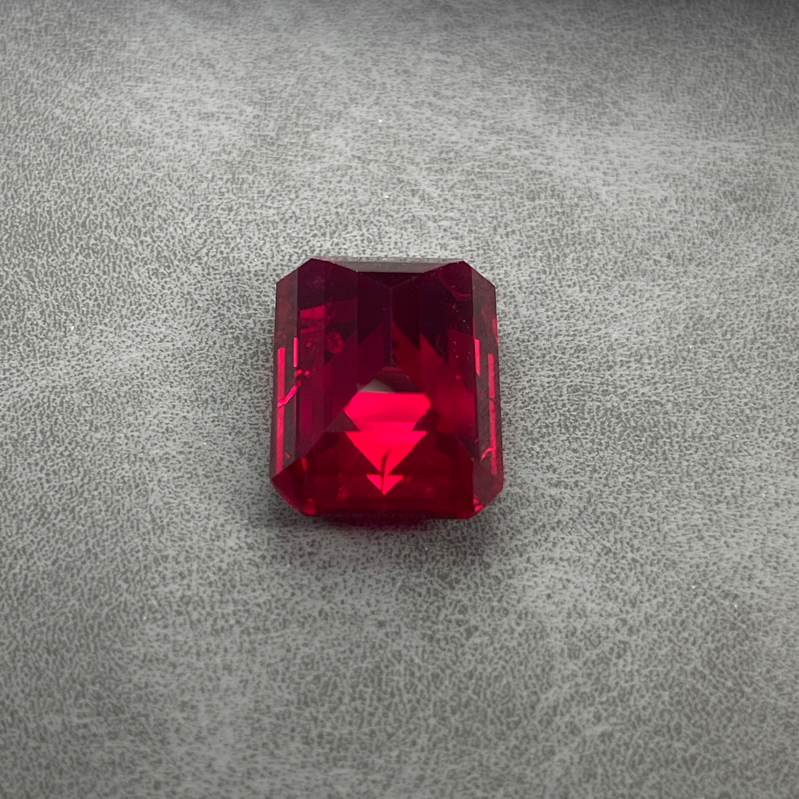 ~30ct Pigeon Blood Ruby | Emerald Cut | 20 × 15 mm | Gemdrop® Verified