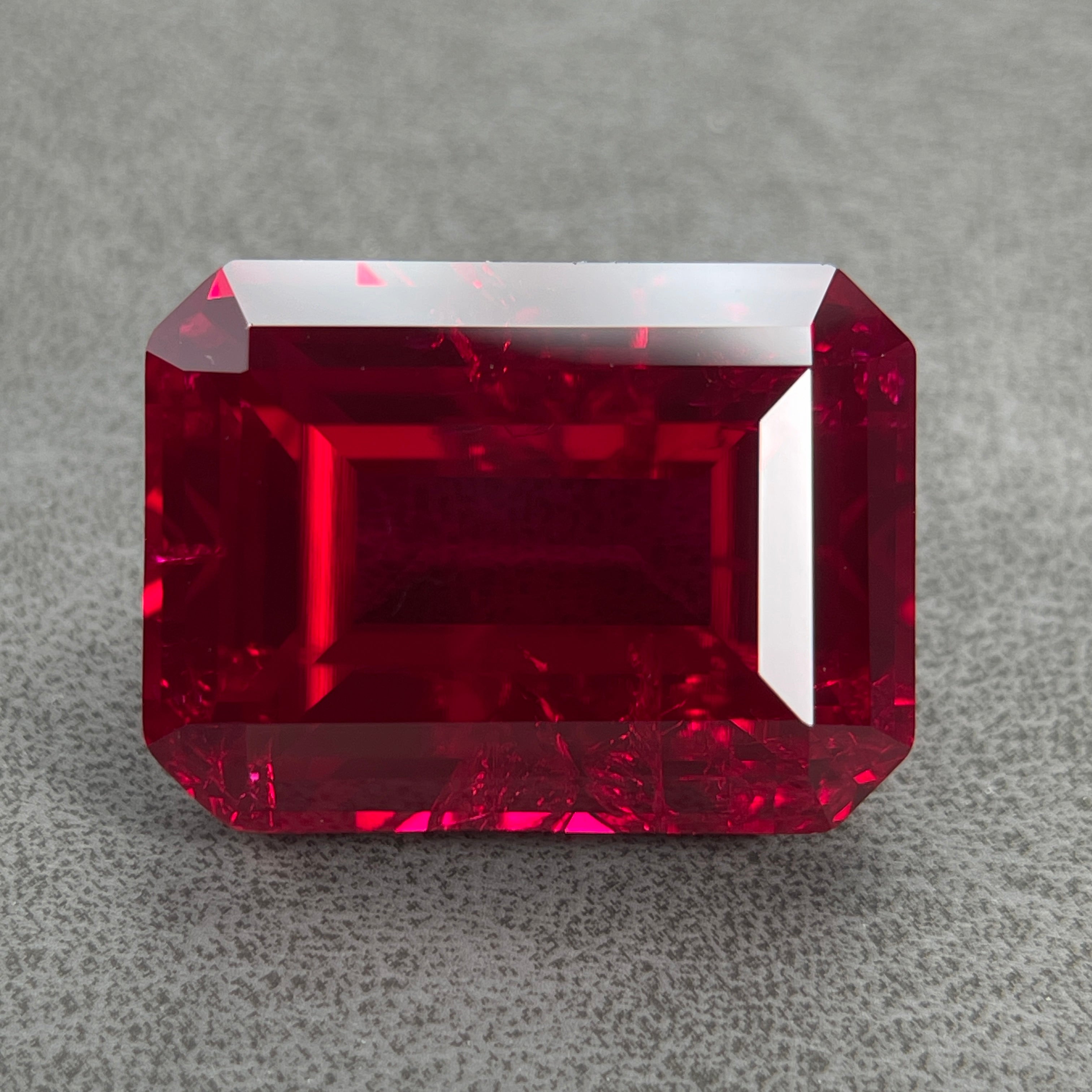 ~30ct Pigeon Blood Ruby | Emerald Cut | 20 × 15 mm | Gemdrop® Verified